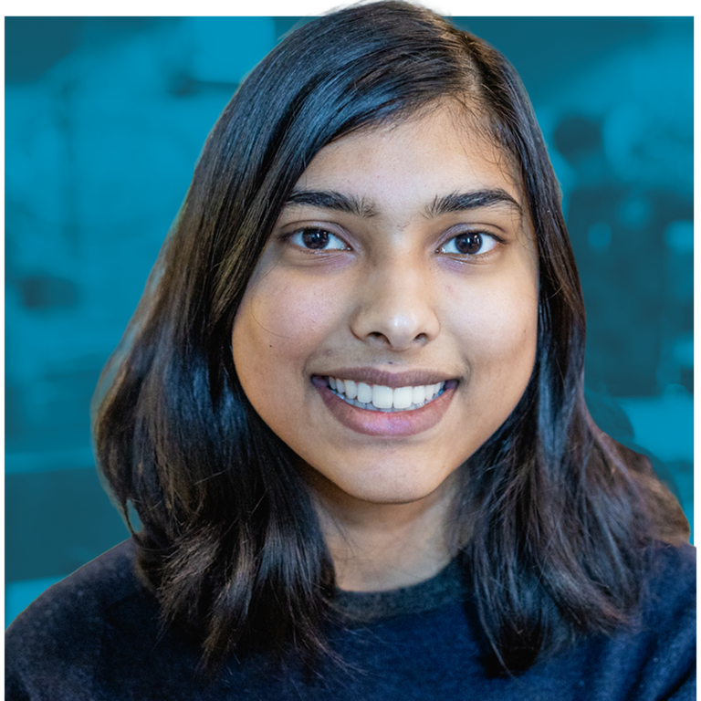 Smiling young woman with dark shoulder-length hair
