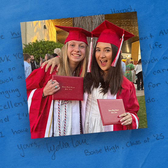 Lydia Love and a friend in red graduation caps and gowns holding their Boise High diplomas, blue textured background surrounds the photo
